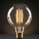 Lâmpada LED Filamento G95 4W Âmbar Decorativa